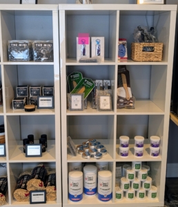 Other shelves include a curated collection of grooming accessories and supplies.