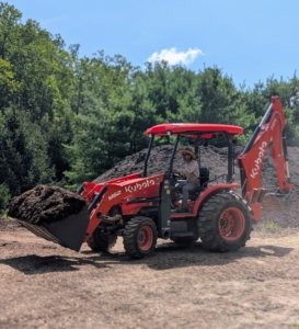 Up in the compost yard, my outdoor grounds crew foreman, Chhiring, continues the tedious job of mulching all the beds around the farm. Thankfully, I am able to make good, nutrient-rich mulch right here. Chhiring is moving a load into the dump truck, so it can be transported to the next area on the list for top dressing - the pinetum.