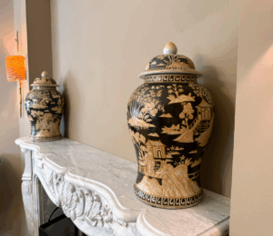 Above this mantel, two decorative urns - also for sale.