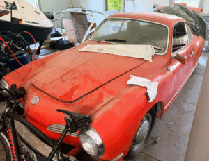 This 1974 Volkswagen Karmann Ghia is a rolling time capsule. Its original red-orange finish carries just the right patina. And it still runs smoothly after all these years.