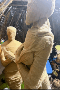 Halloween will be here before you know it. These are life-sized mummy decorations surrounded by other seasonal décor and fun holiday pieces.