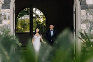 Here they are in the giant doorway of my stable. Don takes this image through the foliage of my potted sago palm. (Photo by Don Hwang)