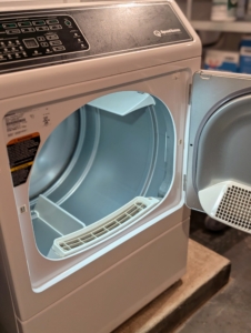 The dryer has a roomy drum capacity for larger loads. The dryer also includes anti-static capabilities. To prevent the dryer from overheating, always clean the screen or filter after every use, and regularly remove accumulated lint from behind the unit.