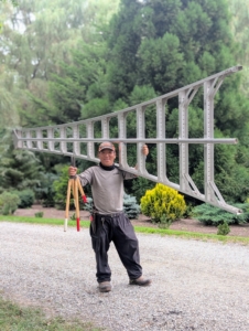 Not far, Phurba gets all his needed gear to prune the boxwood allée shrubs. It's a huge task to prune all the boxwood. Phurba is my resident boxwood pruning expert. He has been with me for many years.