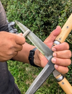 Here he sharpens his Japanese Okatsune shears. The shears are user friendly, and come in a range of sizes.