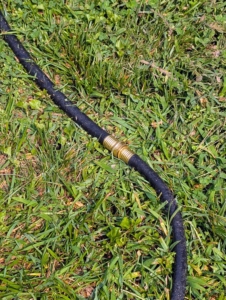 The hoses are connected as they are put down. For the best water use, Pete and Fernando limited the total section lengths to three 50-foot hoses, or 150-feet. These hoses also connect to garden hoses if needed.