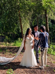 Here, Don sets the scene for the photo. He poses the couple, positions them in the best location for light and background, and then takes a series of images from several different angles.