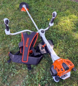 This is a new STIHL FS 361 C-EM Z 20-1/2 inch 37.7cc Gas Powered Brush Cutter with Spark Muffler. This heavy-duty cutter has an ergonomic bike handle with improved grip for better handling and rubberized thumb rests to help reduce user strain.