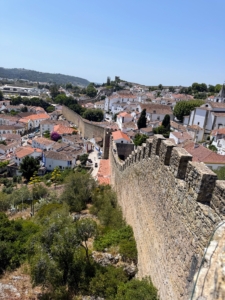 This is Óbidos, a walled and well-preserved medieval village. It is filled with picturesque streets, small shops and cafés.