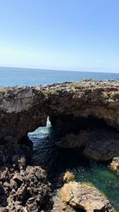 Boca de inferno or "Mouth of Hell" is a scenic cliff formation located west of Cascais, Portugal. It gets its name from the rough ocean waves which crash against the cliff face and spraying viciously from an opening above.