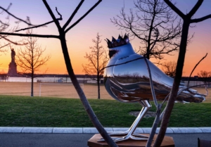 Bird 'MMXXIII' is at Governor's Island in New York. This bird is made of stainless steel with a crown and mirrored belly, situated across the iconic Statue of Liberty ready to greet any and all visitors. (Photo by Ilir Rizaj)