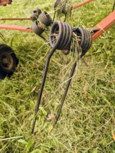 Here is one of the tines that picks up and flips the hay.