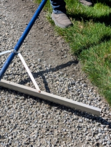 The toothed edge is used for more detailed work such as pushing the gravel to the edge of the grass so all looks manicured and finished. Gravel roads are attractive, easy to maintain, and accumulate less pollutants over time.