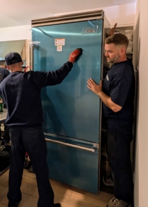 Modern refrigerators are generally lighter than their predecessors because of the use of lighter construction materials and energy-efficient parts. It doesn't take long to get the new unit into the kitchen.