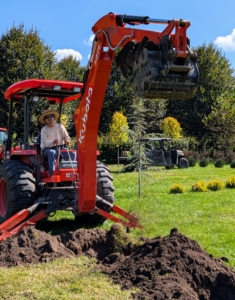 Backhoes are extremely versatile. I am fortunate to have this attachment for our tractor. Backhoes come with a bucket and digging arm that can perform many different tasks.