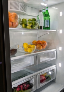 The refrigerator's main compartment is very roomy. The bottom-freezer design allows for easy access to all items. The Adjustable Humidity Zone™ Drawers have humidity controls for food preservation and a soft-close feature to prevent any damage.