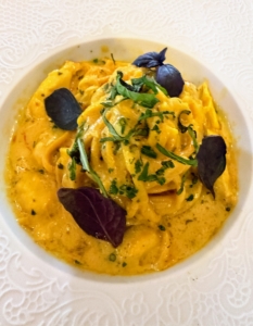 This is Spaghetti Alla Chitarra with Maryland and Blue crab, saffron and opal basil.