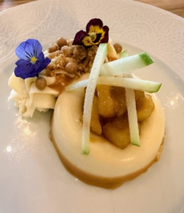 And Cheesecake with honey, pear compote, and candied apple.