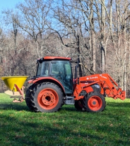 And here, the tractor is used with a 3-point spreader to drop the grass seed in one of my paddocks.