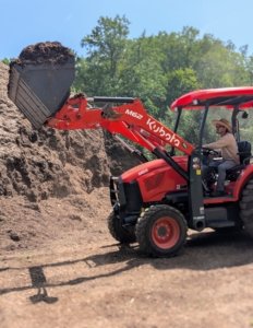 The bucket attachment is used for so many things – from transporting mulch and compost to carrying heavy potted plants to delivering heavy stone and logs.