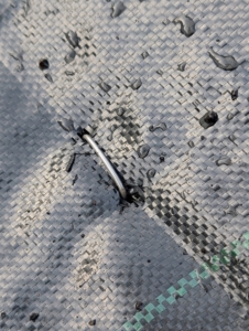 These staples are easy to find at garden stores and can be used in these raised garden beds or on the ground to secure weed fabric or pieces of sod.