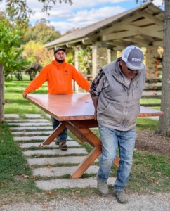 I have a long custom made yew table under my pavilion built from a giant yew tree that was at my former home in East Hampton. It is made of three separate tables and must be moved also. Pete and Alex take it to a glass enclosure off my Equipment Barn.