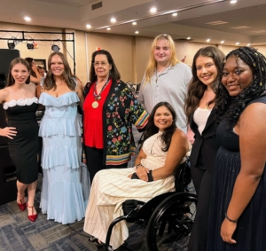 These are recipients, past and present, of the Timothy Long Prize, one of The Foundation's scholarships. They pose at the Oklahoma Music Hall of Fame to celebrate their teacher's lifetime achievement award.