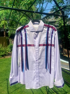 This is a traditional Native American ribbon shirt that Laura crafted for Tim.