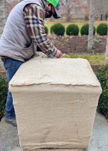 The top is also pulled tight and sewn closed.