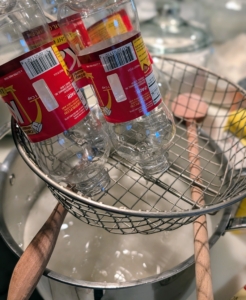 Also for the chocolate pecan tarts - corn syrup. I use a strainer held over the pot with wooden spoons and then turn the bottles upside down to empty - frees up my hands to do other things.