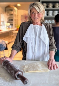 Here I am rolling out one of the pâte brisée discs. When rolling, make sure there are no cracks. To fit a nine-inch pie plate, roll out an 11-inch round that’s about 1/8-inch thick. I have been making this pâte brisée for many years and have perfected this recipe. It calls for two-and-a-half cups all-purpose flour, one teaspoon kosher salt, one teaspoon granulated sugar, two sticks unsalted butter, and a quarter to a half cup of ice water.
