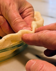 I told my baking team it isn't worth all the work if the pie crust isn't done right. I taught Matt how to crimp the pie crust, so it is well defined. Crimping is not only decorative, but if done properly, it makes it less likely the sides of the pie will fall or shrink during baking.