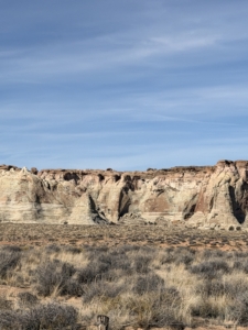 This is a view of Stud Horse Mesa. It is characterized by a narrow promontory that overlooks Lake Powell.