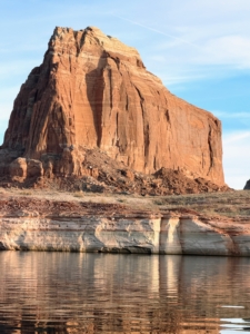 The summit of Padres Butte at Lake Powell is about 4000 feet. It was formerly an island in the lake, but now with lake waters declining, land has exposed its connection to the rest of Padre Point.