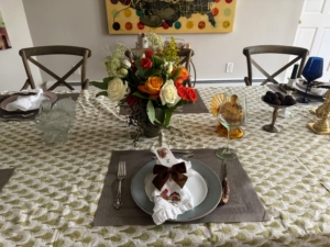 Lots of turkeys and fall colors on the table.