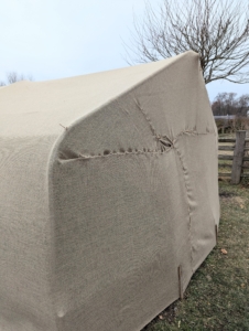 Here is what the end sections look like all sewn together. The fabric is pulled taut and secured – all by hand.