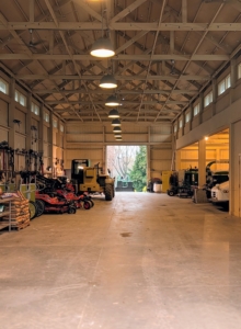 The crew cleaned and organized the giant Equipment Barn. All the equipment is checked and cleaned and put away on one side of the room. Any manual tools are also cleaned and hung on designated hooks so everything is easy to find and access.