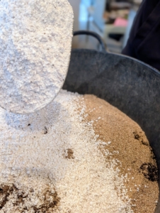 Then he added some perlite, which is an amorphous volcanic glass and used as a draining and filtration agent.