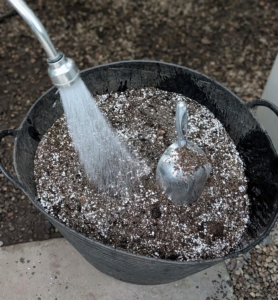 Next, Ryan moistens the mix.