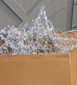 I hang shooting stars on the outside of several buildings every year here at the farm.