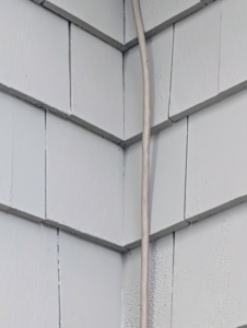 And here’s a tip: when using extension cords to connect outdoor decorations, use supplies that match the exterior of the building. I use grayish-tan extension cords, so they are not seen against the siding. They can also be painted to match. And be certain any electrical supplies are safe to use outdoors.
