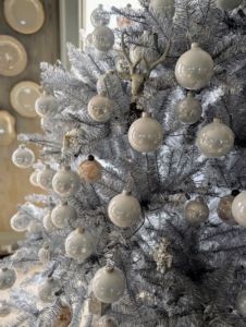 In my sitting room - silver Christmas trees with silver and white ornaments.