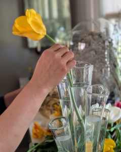 Putting tulips and other flowers in water soon after cutting prevents stems from sealing, which can slow water uptake and reduce freshness.