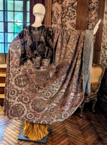 This year, the main exhibit is the Rosen House Focus Tour: Inside Lucie's Wardrobe. It offers guests an interesting look at Lucie Rosen's fashions through the years - some of which would still look radiant today. This is an evening coat made out of Fortuny stamped silk velvet.