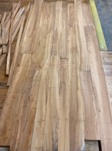 Here is a section of the table at the shop after pieces are selected and laid out.
