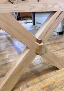 This is one base after the cross piece was secured to the trestles. A trestle is a framework consisting of a horizontal beam supported by two pairs of sloping legs to hold up a flat surface such as a tabletop.