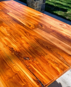The heartwood of yew tends to be an orange-brown, at times a darker brown. It is often used for cabinetry and tool handles. The hard, slow-growing wood is also used to make gates, furniture, parquet floors, and paneling.