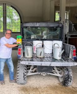 Aside from his love for photography, Carlos also enjoys helping me with the gardening. He feeds many of the plants for me - with Miracle-Gro, of course.
