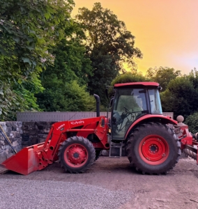 Nearby, Carlos takes this photo of our trusted Kubota tractor, which is used for so many jobs here at the farm.