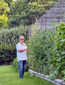 Here's Carlos in my half-acre vegetable garden. What are you harvesting for me, Carlos?
